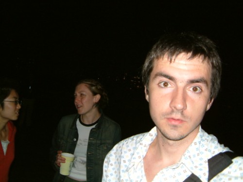 with these people i travelled to a distant rooftop in brooklyn